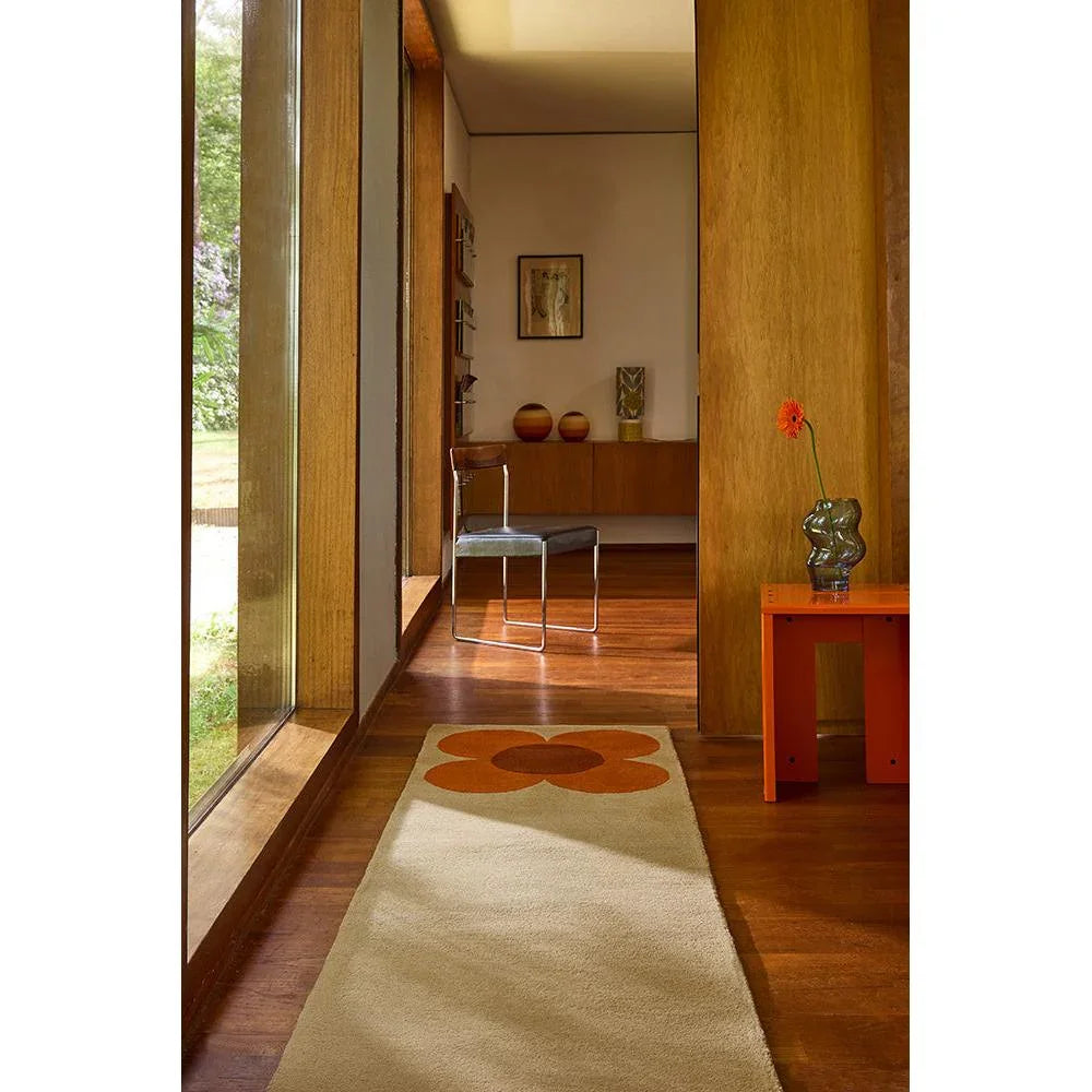 Orla Kiely Flower Placement Pumpkin Ecru Rug featuring floral pattern in pumpkin orange and beige on ecru background, hand-tufted wool