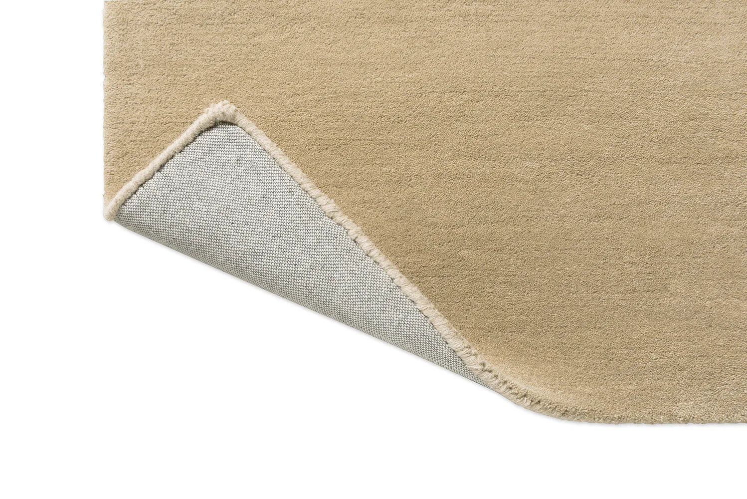Orla Kiely Flower Placement Rug featuring solid texture in beige, tan and cream on light cream background, hand-tufted wool