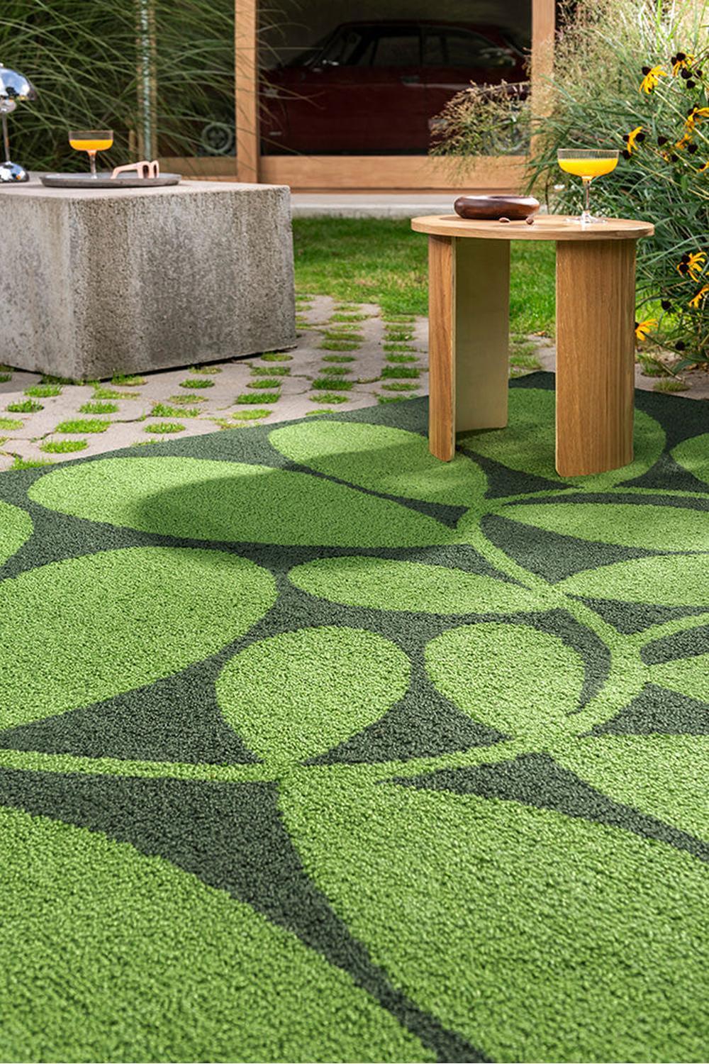 Orla Kiely Sycamore Dill Outdoor Rug with circular lime, olive and charcoal pattern on light green background, power-loomed polypropylene