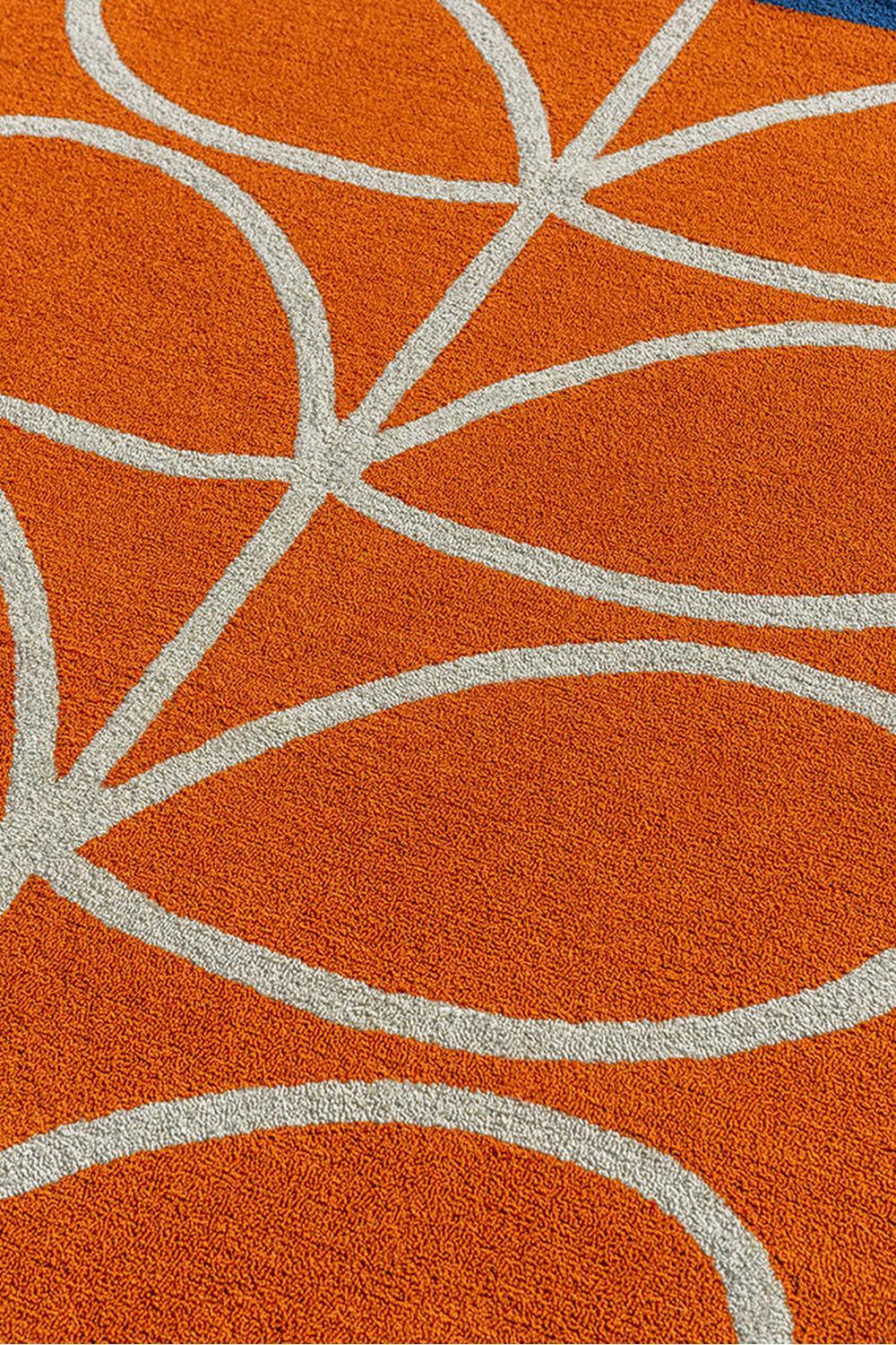 Orla Kiely Linear Stem Orange Outdoor Rug featuring abstract curved line motif in bright orange and ivory on orange background, power-loomed polypropylene