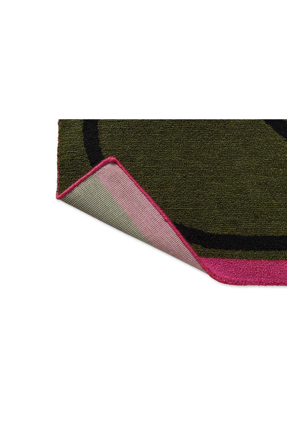 Orla Kiely Linear Stem Olive Outdoor Rug featuring a linear stem pattern in olive, black and pink on olive ground, machine-woven outdoor polypropylene