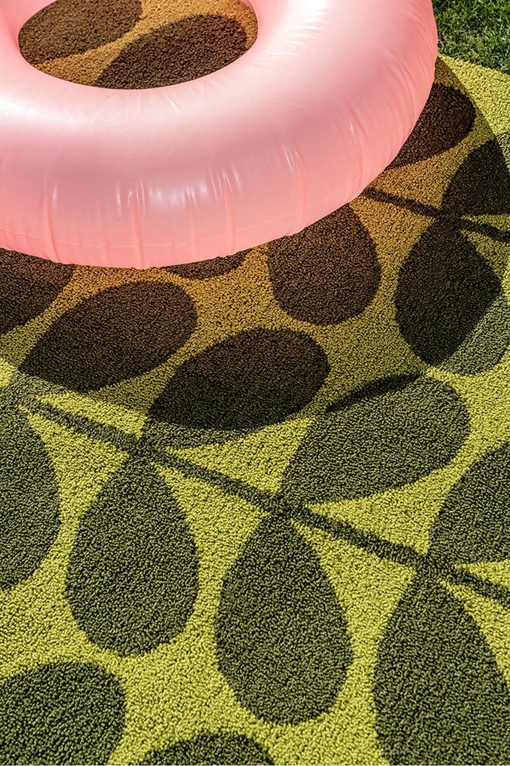 Orla Kiely Solid Stem Seagrass Outdoor Rug featuring stem pattern in lime green, olive & brown on bright lime background, power-loomed polypropylene