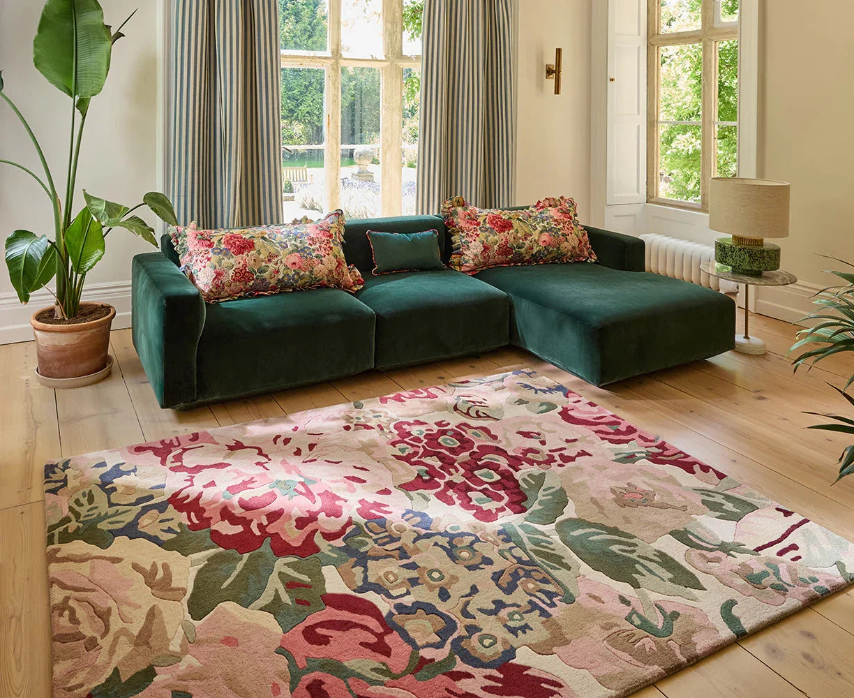 Sanderson Rose & Peony Red Designer Rug featuring floral pattern in pinks, reds, greens, blues on cream background, hand-tufted wool