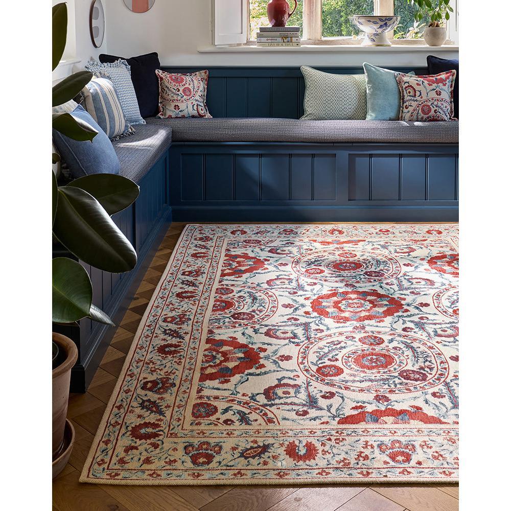 Sanderson Anthos Red Indigo Designer Rug featuring traditional Persian-style medallion floral motif in red, indigo, ivory on ivory background, hand-tufted wool