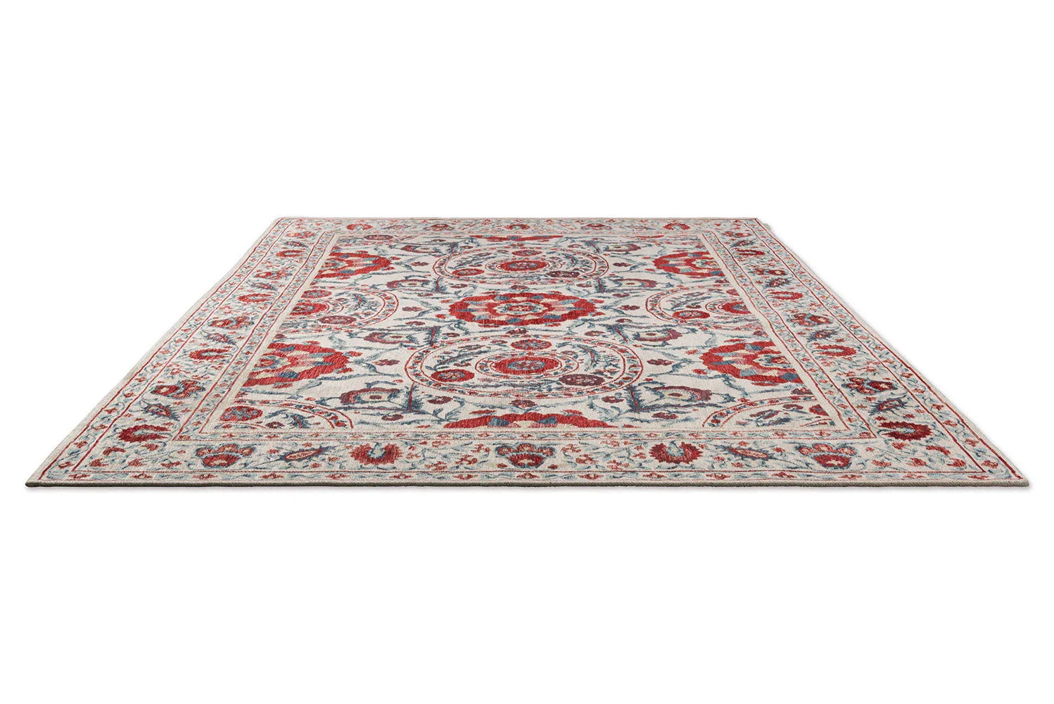 Sanderson Anthos Red Indigo Designer Rug featuring floral medallion pattern in red, indigo and ivory on cream background, hand-tufted wool
