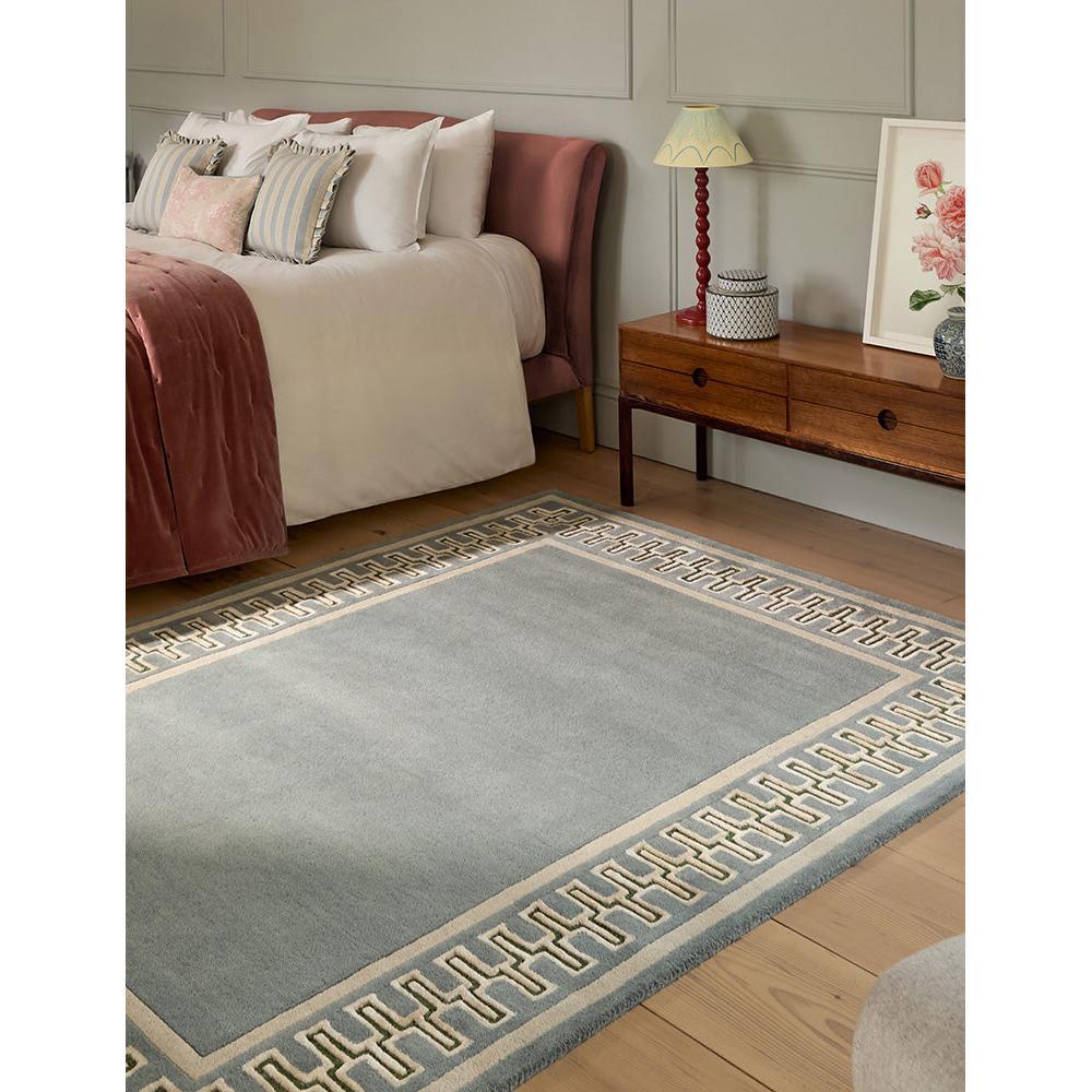 Sanderson Linnean Porcelain Designer Rug featuring Greek key border in cream/beige on blue background, hand-tufted wool
