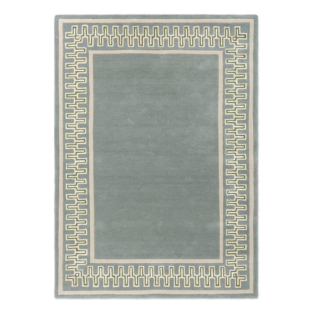 Sanderson Linnean Porcelain hand-tufted wool rug featuring Greek key-inspired geometric border in jade green, cream, and sage with solid jade centre
