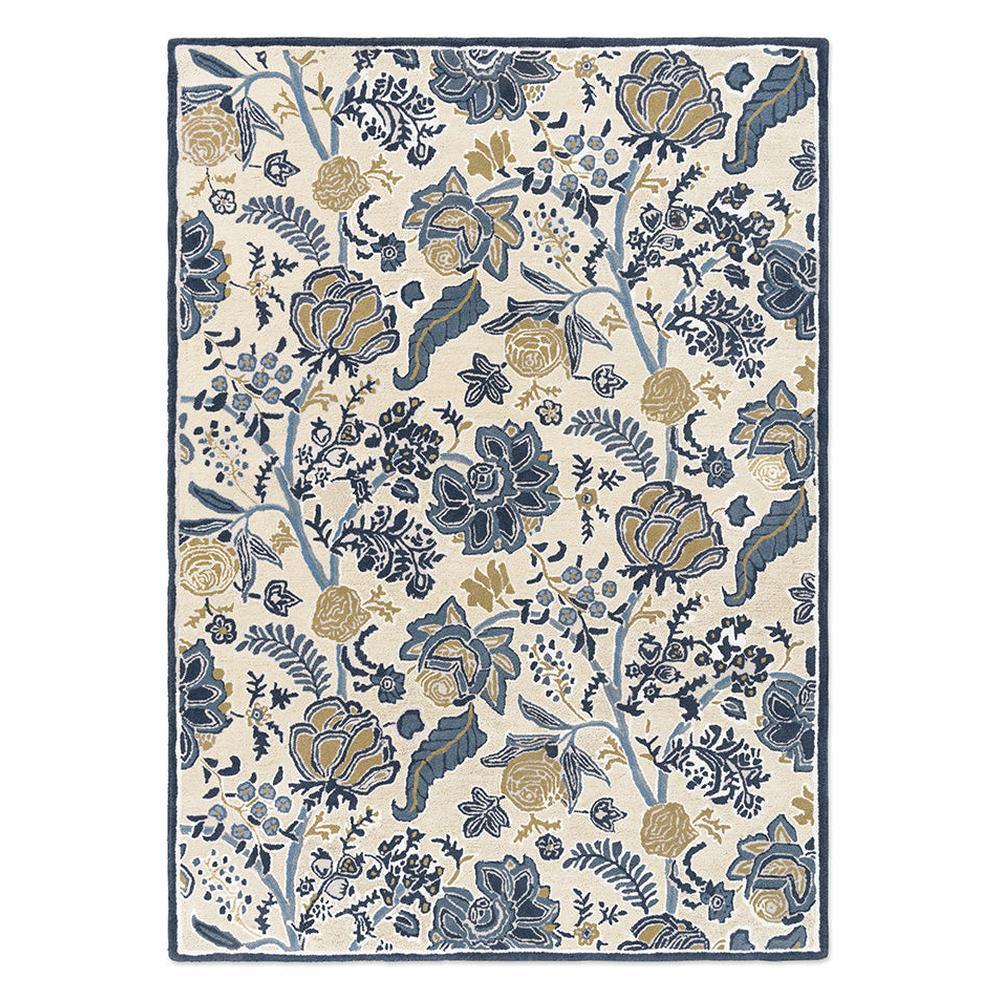 Sanderson Shalimar China Blue Designer Rug featuring a botanical floral pattern in rich china blue, navy, ochre and sage-grey on a soft cream background, hand-tufted wool.

