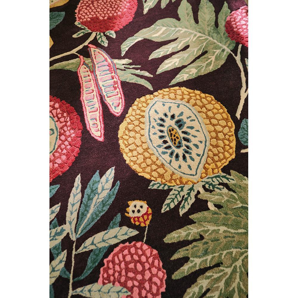 Sanderson Jackfruit Cherry Alabaster Rug featuring botanical floral pattern in ochre, pink, mint green on dark burgundy, hand-tufted wool