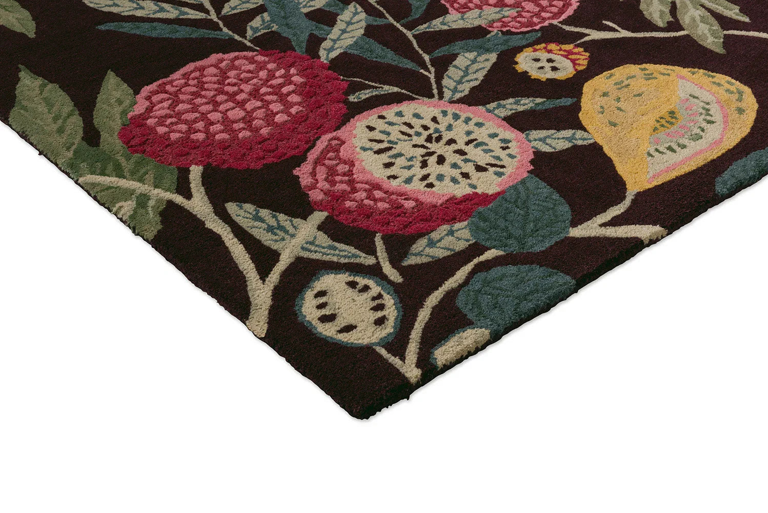Sanderson Jackfruit Cherry Alabaster Rug featuring botanical floral pattern in burgundy, pink, cream, mustard on dark brown background, hand-tufted wool
