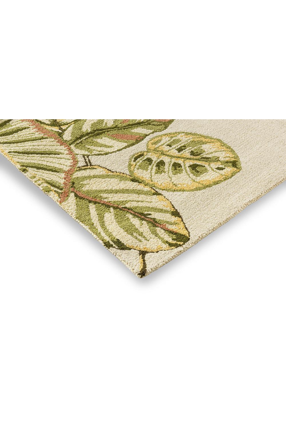 Sanderson Calathea Samphire outdoor rug featuring botanical leaf pattern in cream, sage-green, olive and brown on beige background, machine-made polypropylene