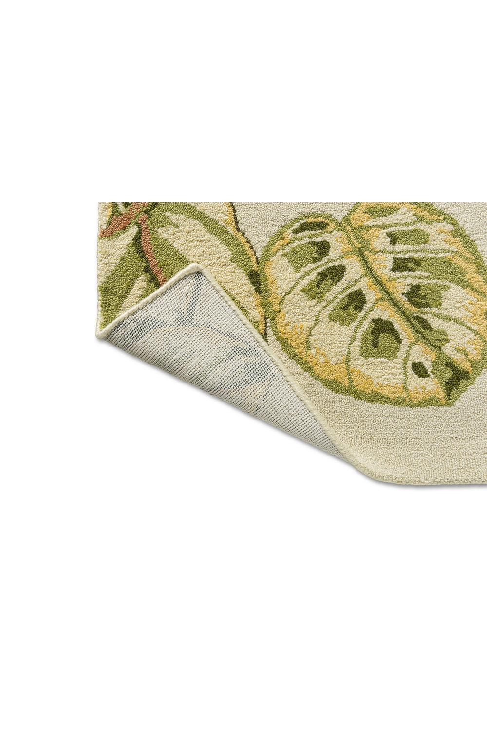 Sanderson Calathea Samphire Designer Outdoor Rug featuring botanical leaf pattern in olive, sage-green, lime and cream on beige background, hand-tufted polypropylene