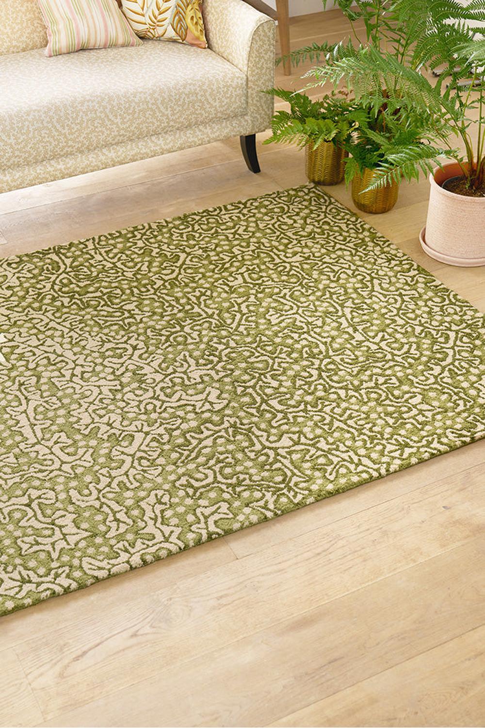Sanderson Truffle Olive Designer Outdoor Rug featuring organic botanical pattern in olive green and cream on beige background, machine-made polypropylene
