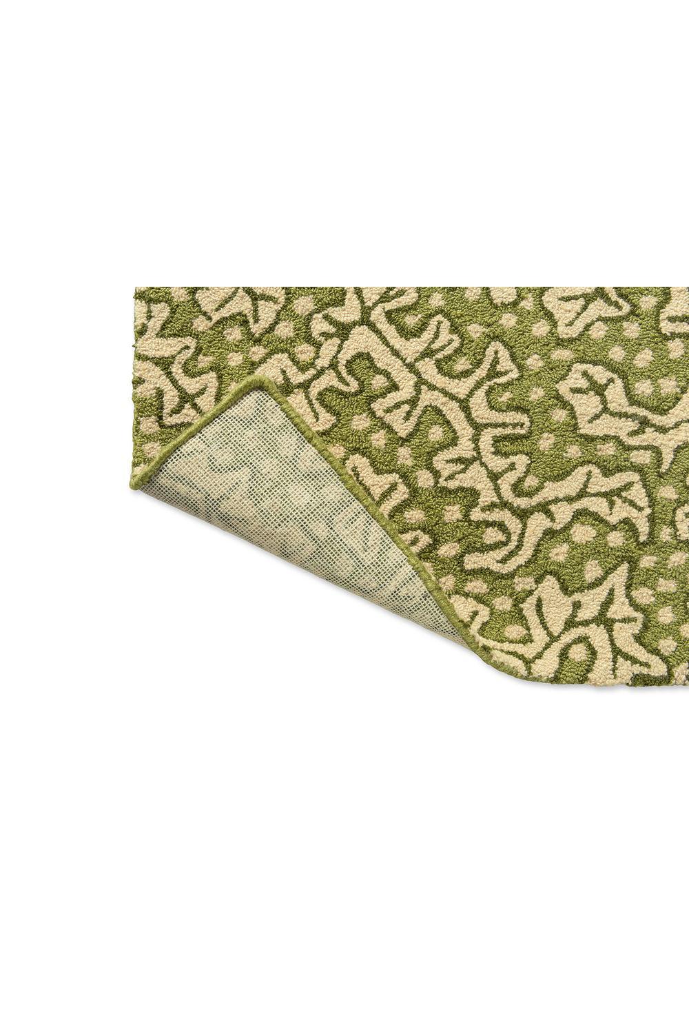 Sanderson Truffle Olive Outdoor Rug featuring olive and cream vine pattern on pale beige background, power-loomed polypropylene