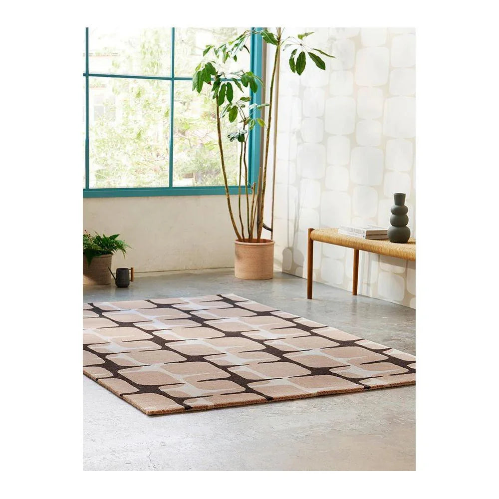 Scion Going Lohko - Dusk rug featuring geometric lozenge pattern in tan, taupe and brown on cream, machine-woven wool