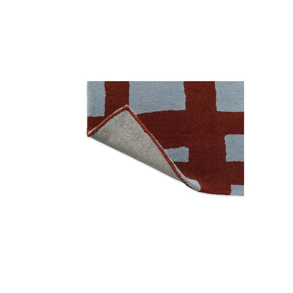Scion Arlo Brick Designer Rug featuring brick-pattern in brick red, dusty blue and cream on off-white background, hand-tufted wool
