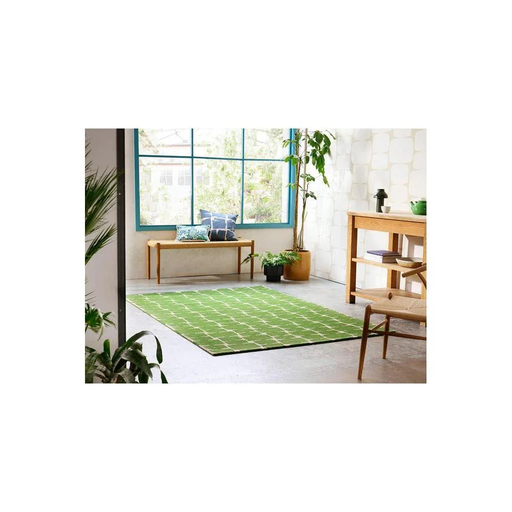 Scion Little Lohko - Juniper Designer Rug featuring geometric grid pattern in juniper green, white and olive on light grey floor, hand-tufted wool