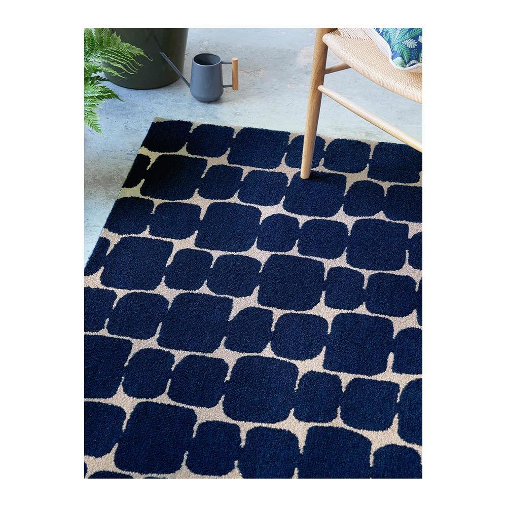 Scion Little Lohko - Indigo Rug featuring geometric rounded-block pattern in navy blue on beige background, hand-tufted wool
