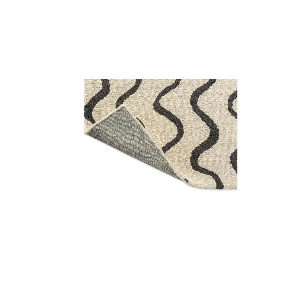 Scion Ribbon - Charcoal Designer Rug featuring wavy ribbon pattern in cream, black and charcoal on cream background, hand-tufted wool