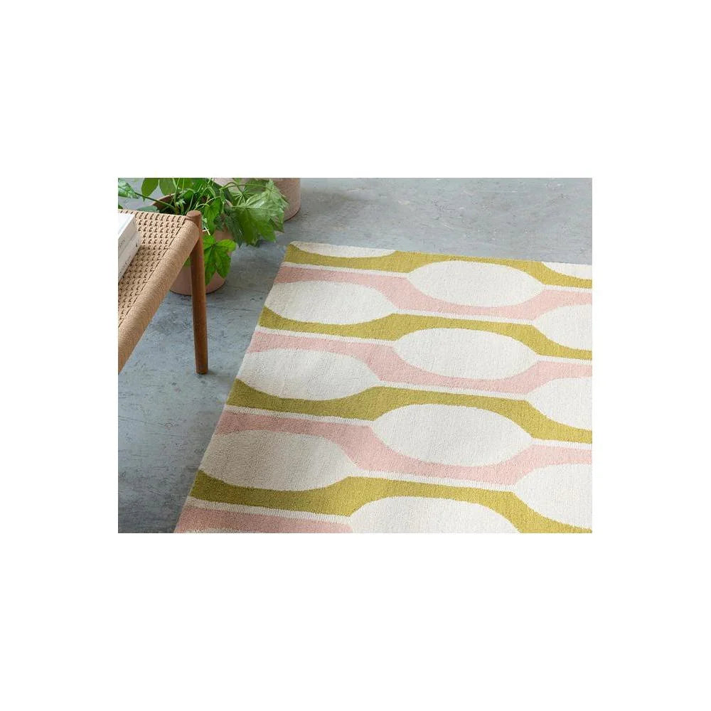 Scion Billow Lichen rug featuring retro wavy pattern in pale pink, olive and cream on white background, hand-tufted wool