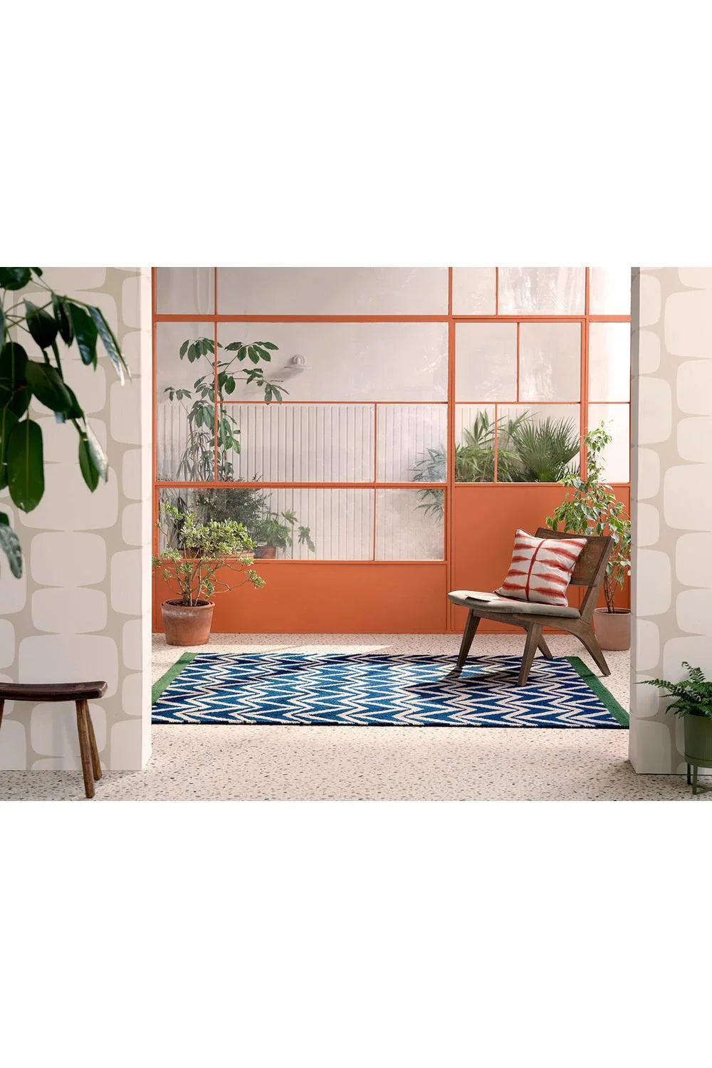 Scion Dhurrie Blue Designer Outdoor Rug featuring chevron pattern in navy, royal blue and white on a green border, flat-weave polypropylene