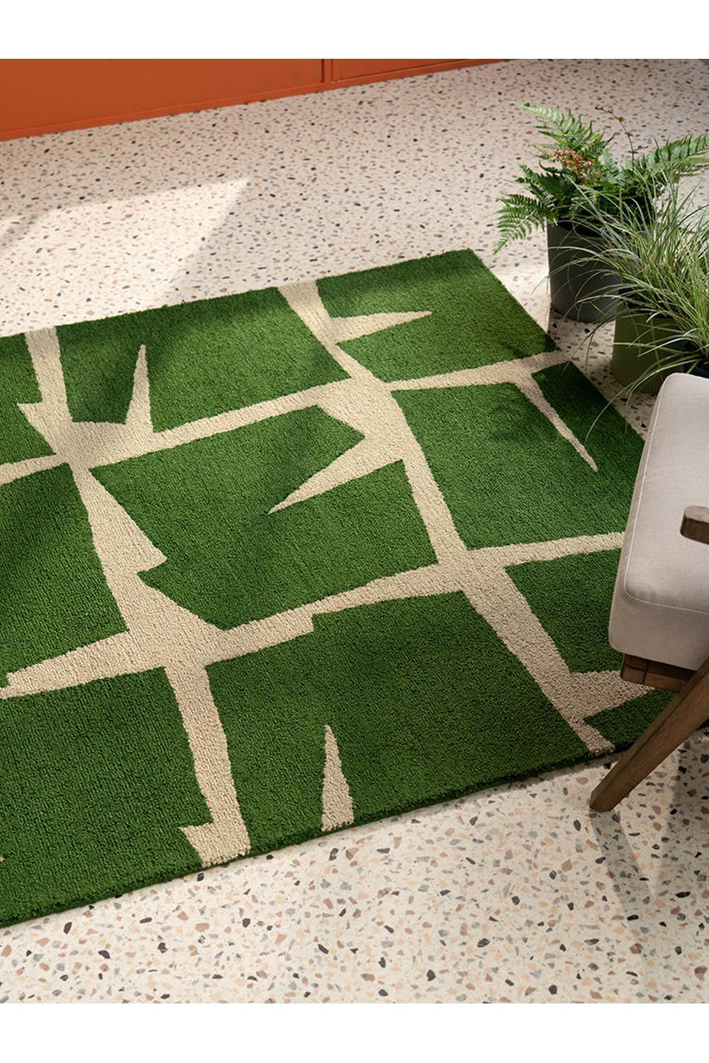 Scion Moqui Green Designer Outdoor Rug featuring geometric block pattern in olive green and beige on a light beige background, machine-woven polypropylene