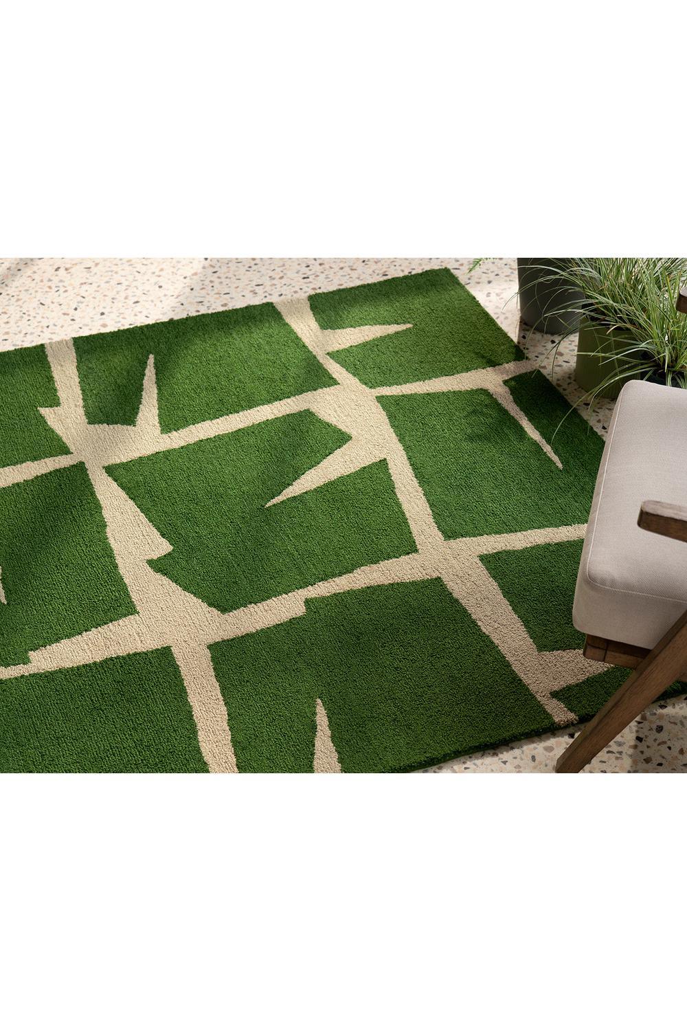 Scion Moqui Green Designer Outdoor Rug featuring geometric lattice pattern in moss green, sage green and beige on cream background, machine-woven polypropylene