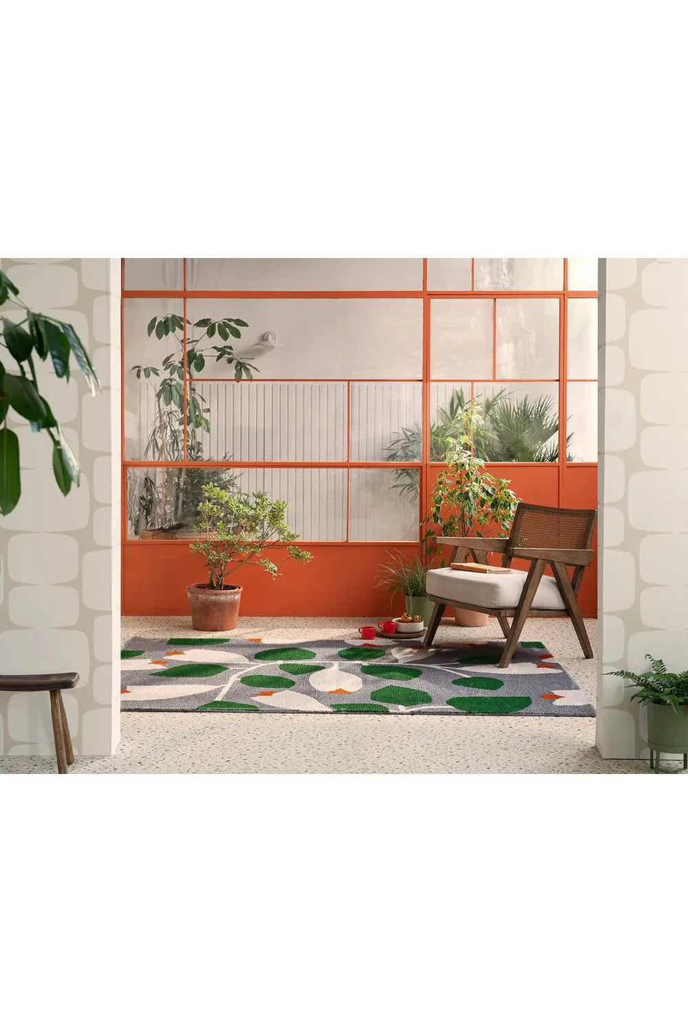 Scion Rosehip Blue Designer Outdoor Rug featuring botanical leaf pattern in green, white and orange on grey background, machine-woven polypropylene