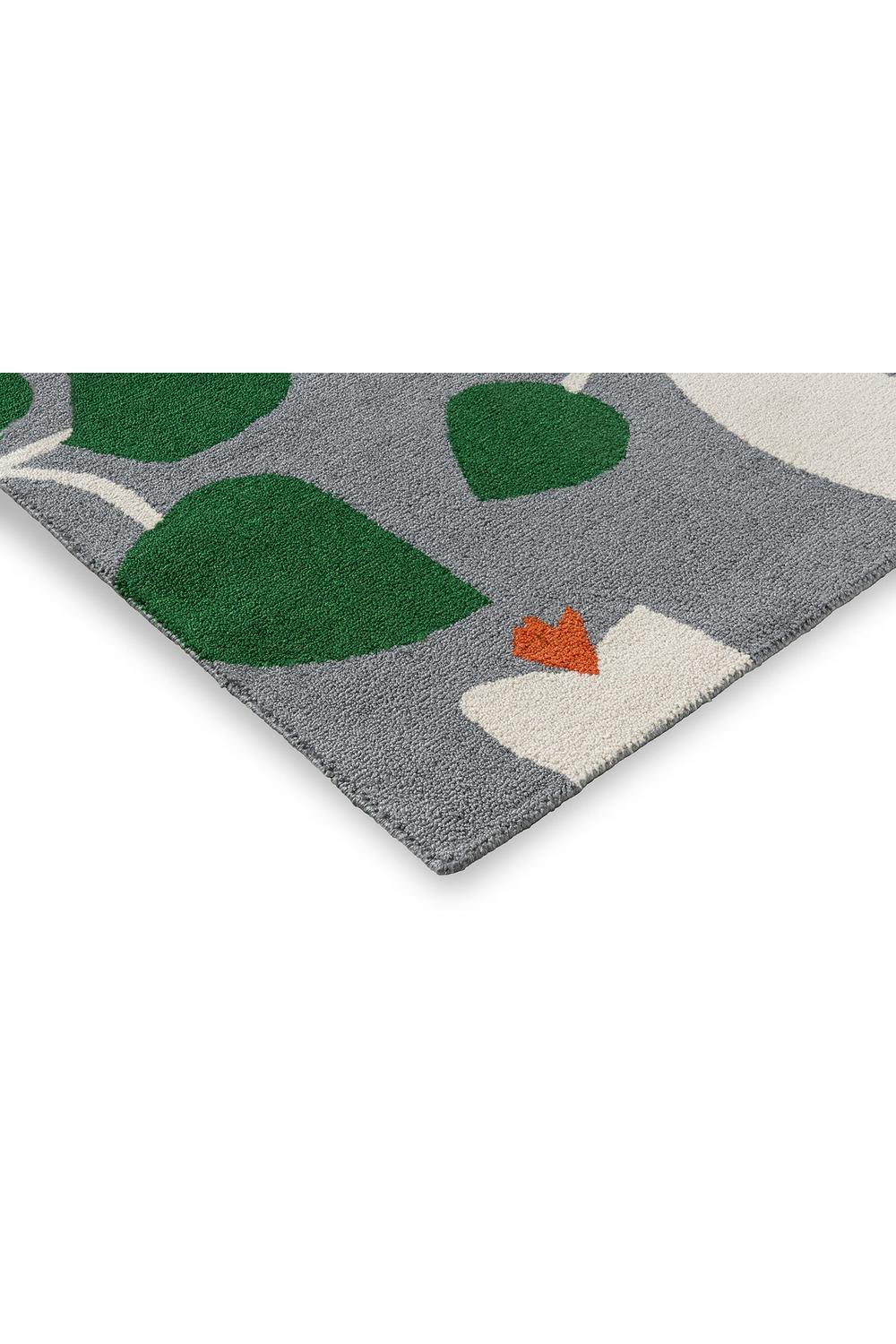 Scion Rosehip Blue Outdoor Rug featuring botanical leaf pattern in emerald green, sage & ivory on grey background, outdoor polypropylene.