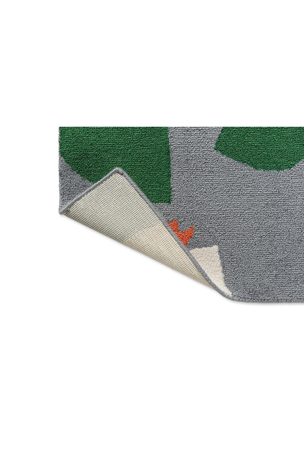 Scion Rosehip Blue Outdoor Rug featuring abstract botanical blocks in emerald green and sage grey on grey background, power-loomed polypropylene