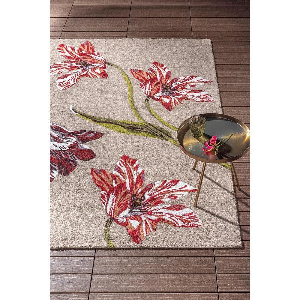 Ted Baker Tulip Burgundy Outdoor Rug featuring tulip motif in burgundy, red, white and green on beige background, loomed polypropylene