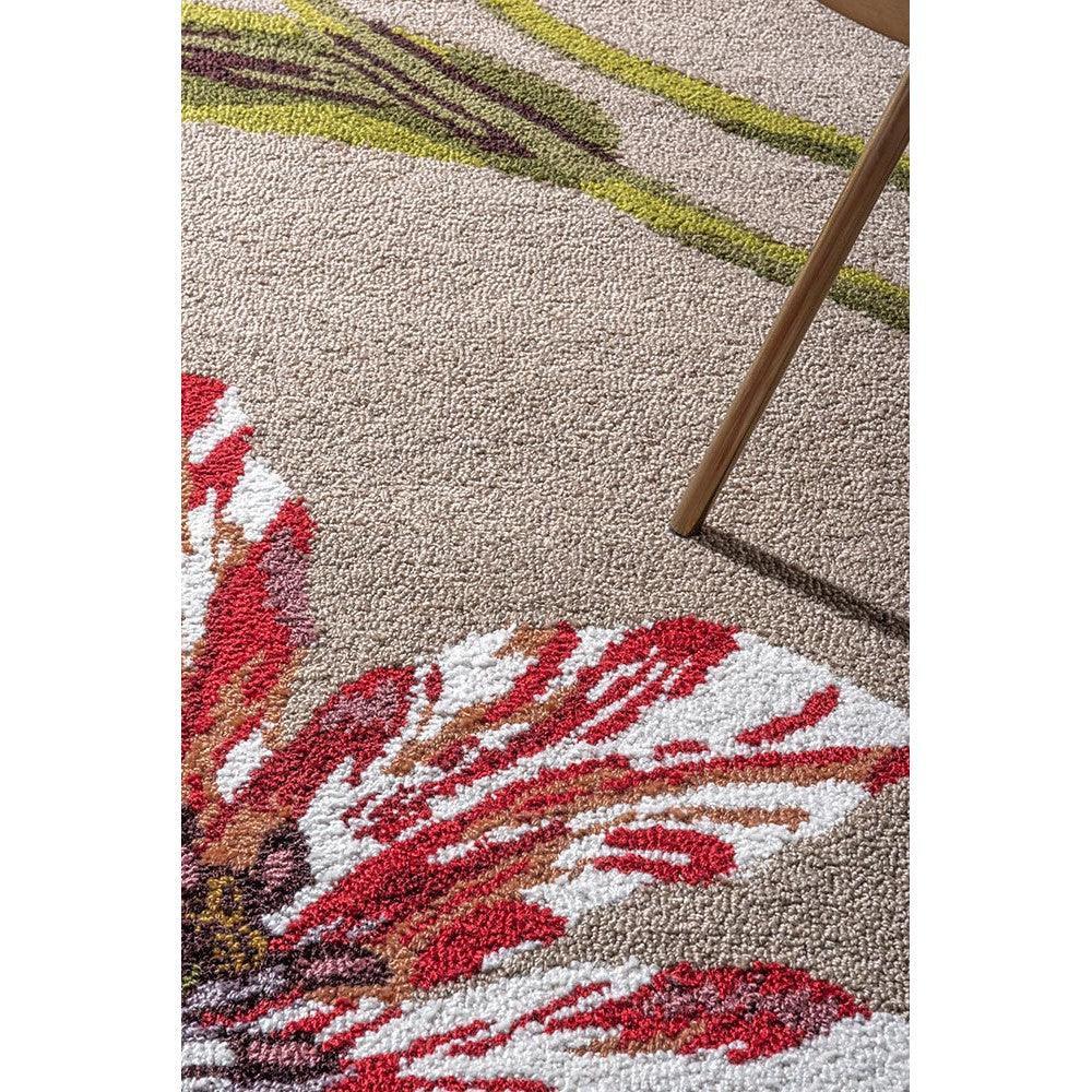 Ted Baker Tulip Burgundy Outdoor Rug featuring burgundy tulip motif on beige background, machine-made polypropylene