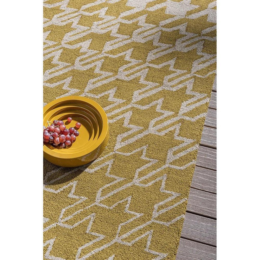 Ted Baker Houndstooth Mustard Outdoor Rug featuring houndstooth pattern in mustard and ivory on cream background, outdoor collection, power-loomed rug