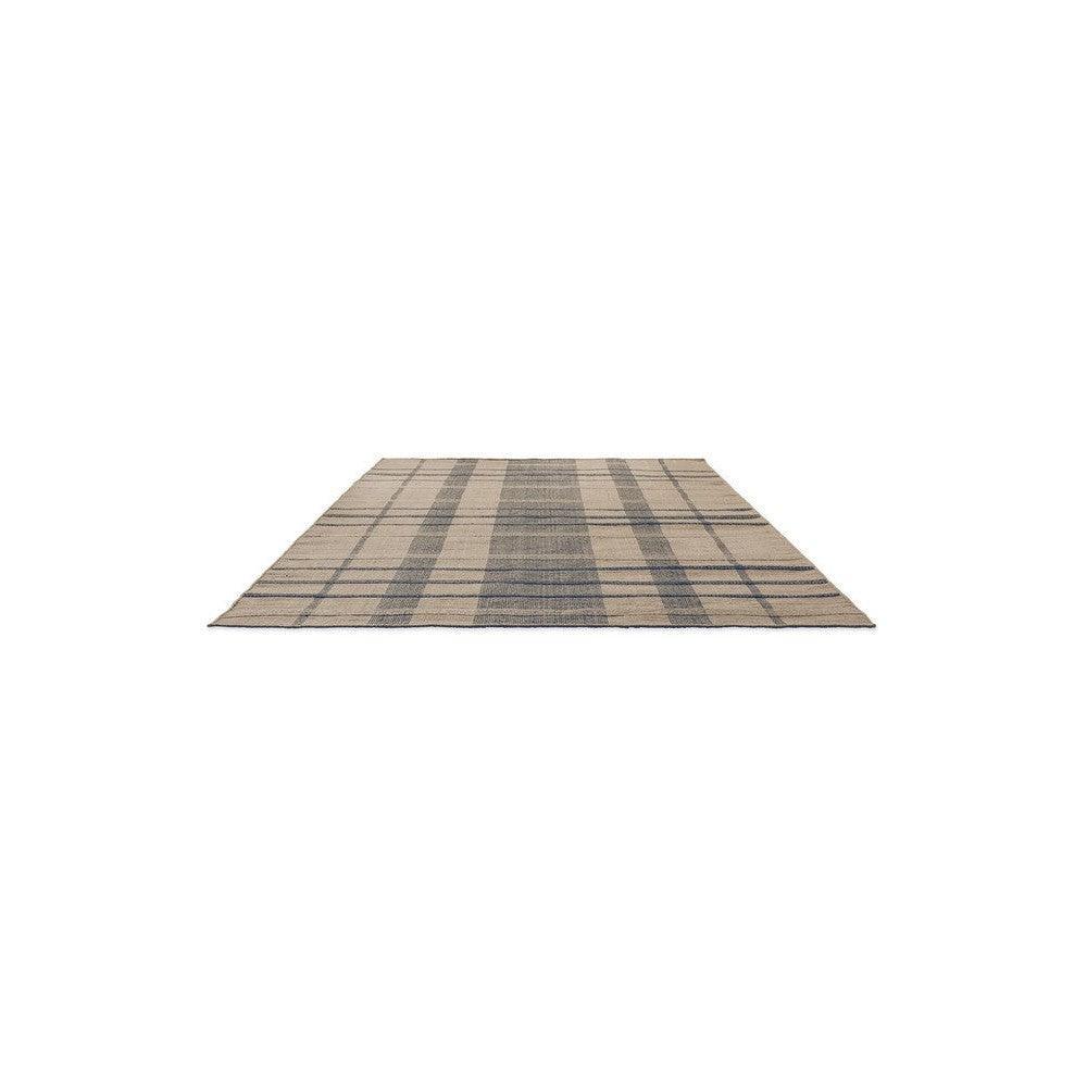 Brink & Campman Zona Denim Check outdoor rug featuring plaid in denim blue, navy and beige on beige background, machine-woven polypropylene
