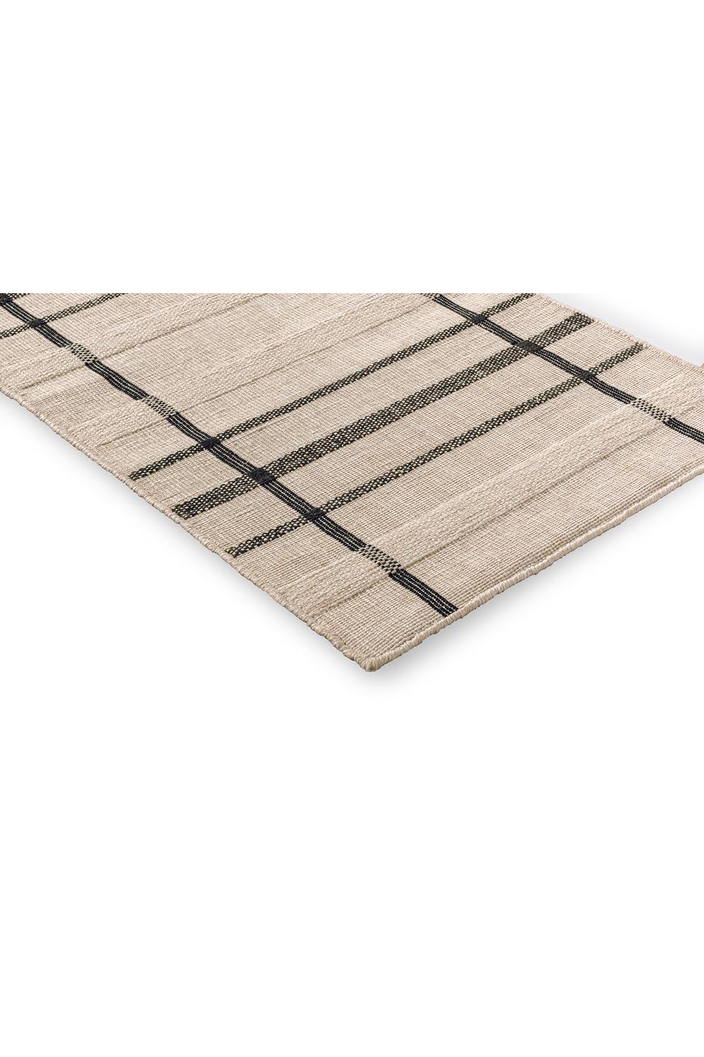 Brink & Campman Zona Charcoal Line Runner featuring beige background with black plaid lines, outdoor rug, machine-woven