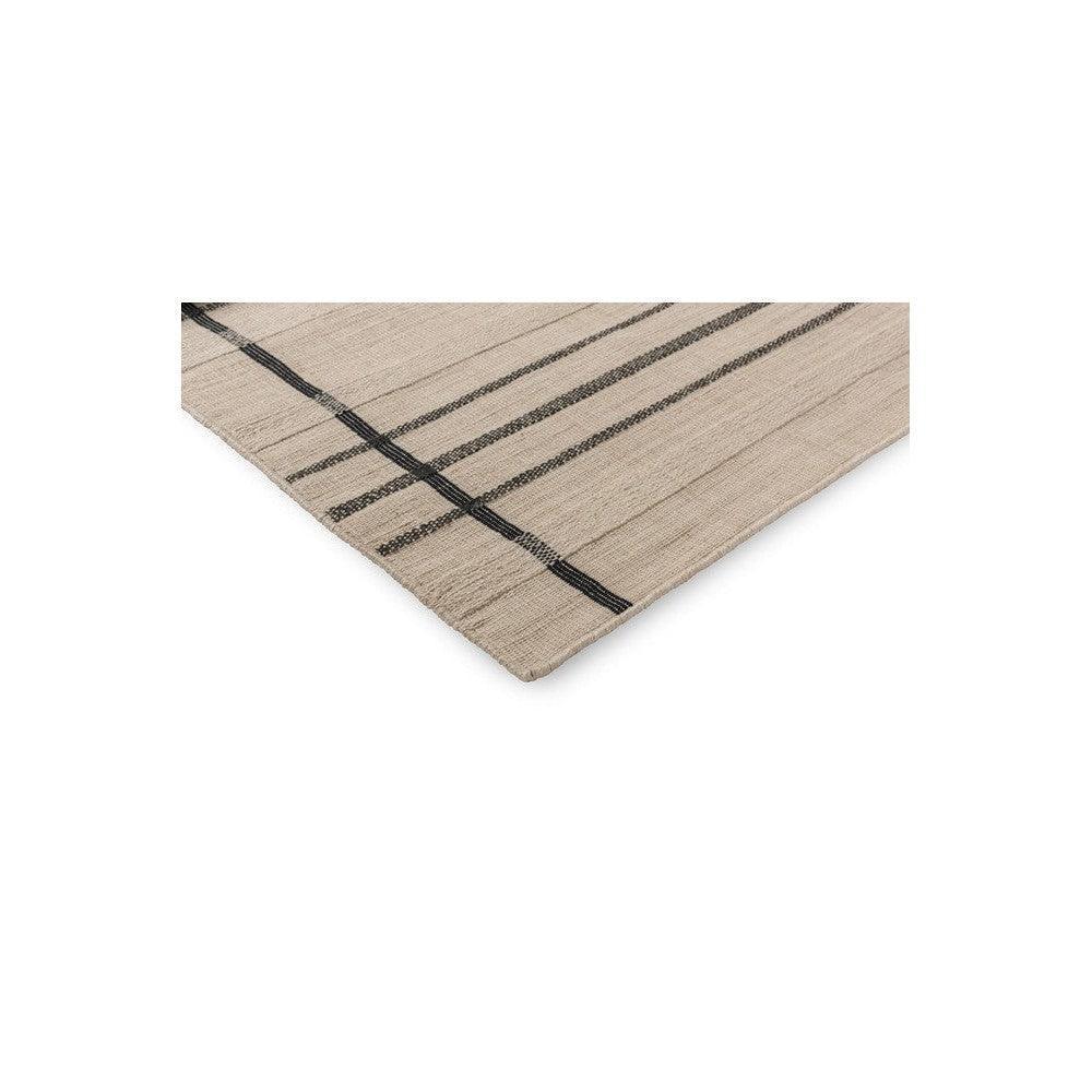 Brink & Campman Zona Charcoal Line outdoor rug featuring linear stripe pattern in charcoal and beige on beige background, outdoor-friendly synthetic fibers