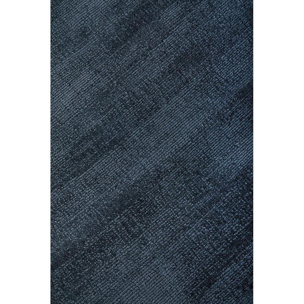 Joy Denim Rug featuring textured weave in denim blue, navy and indigo on white background, construction unknown, material unknown