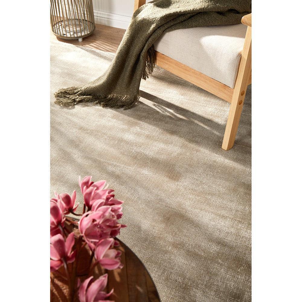 Joy Silver Rug featuring minimalist woven texture in beige, taupe and cream on silver-beige background, machine-woven polyester
