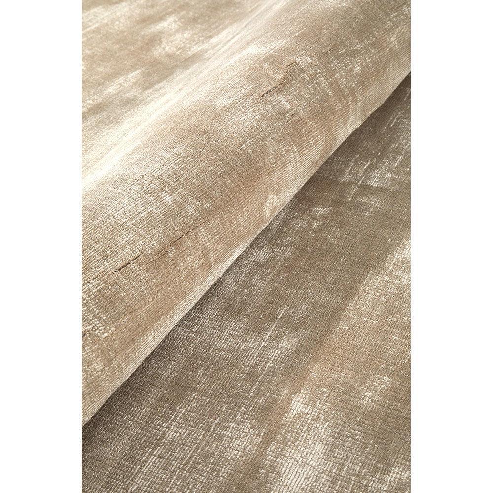 Joy Silver Rug featuring abstract distressed metallic texture in champagne and taupe on beige background, machine-made polyester