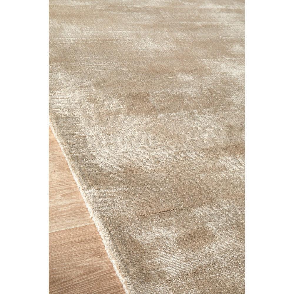 Joy Silver Rug featuring soft, abstract distressed pattern in ivory, beige and cream on light beige background, machine-made rug