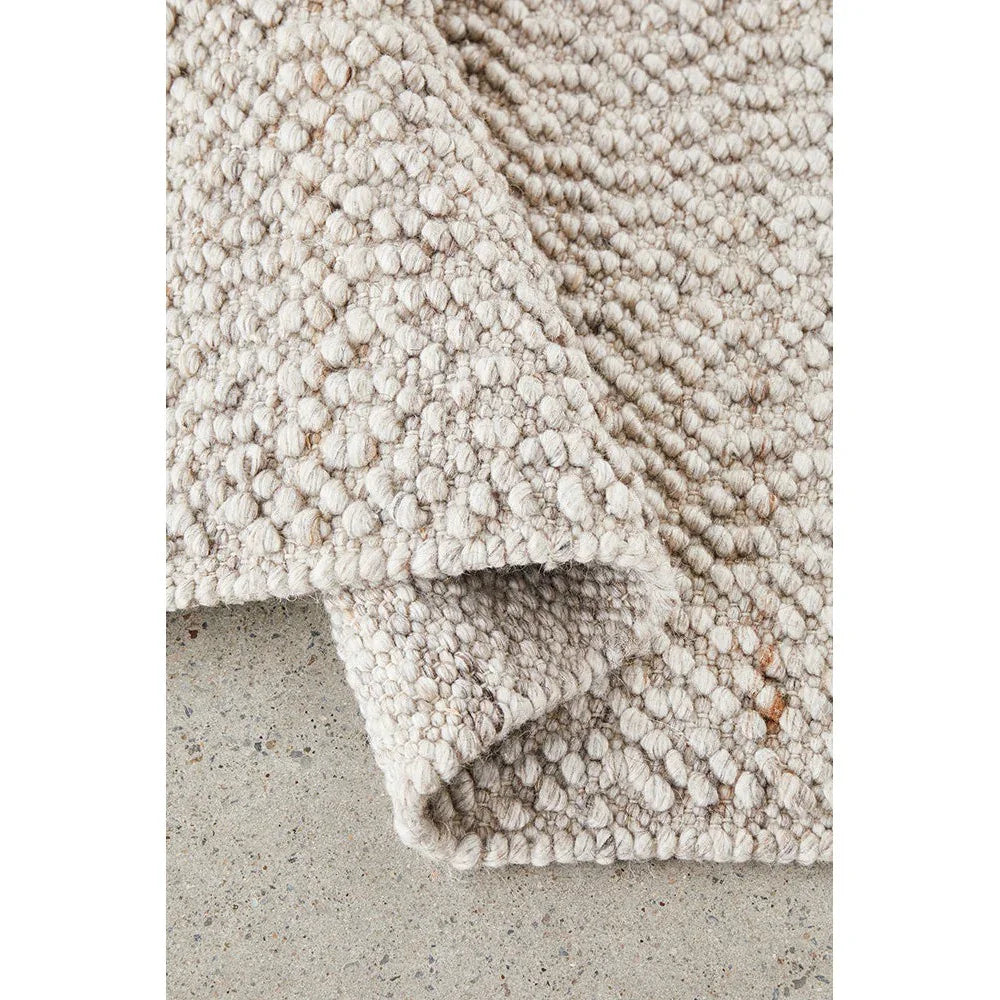 Boucle Natural Rug from the Boucle Collection by RUG CULTURE featuring a plush looped texture in warm cream and beige on a light background