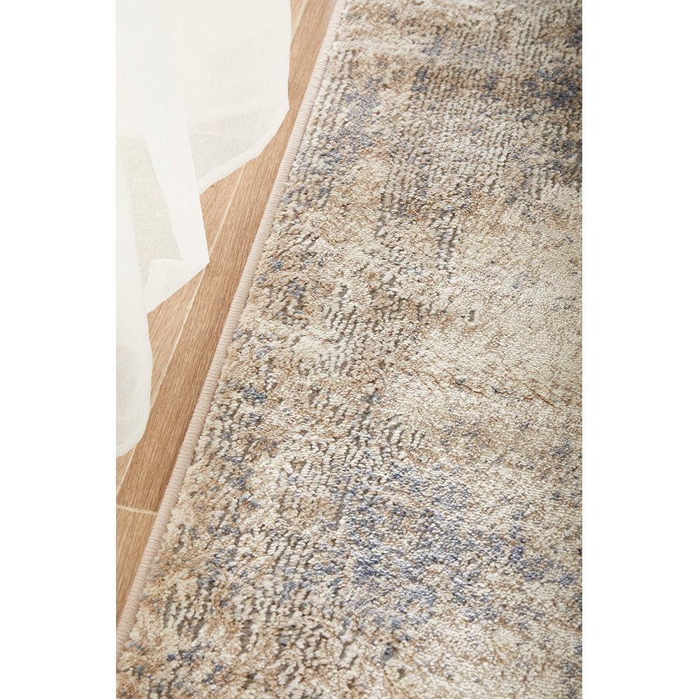 Bronte Aldo Sky Runner Rug featuring abstract pattern in beige, cream, taupe and light blue on ivory background, woven polypropylene