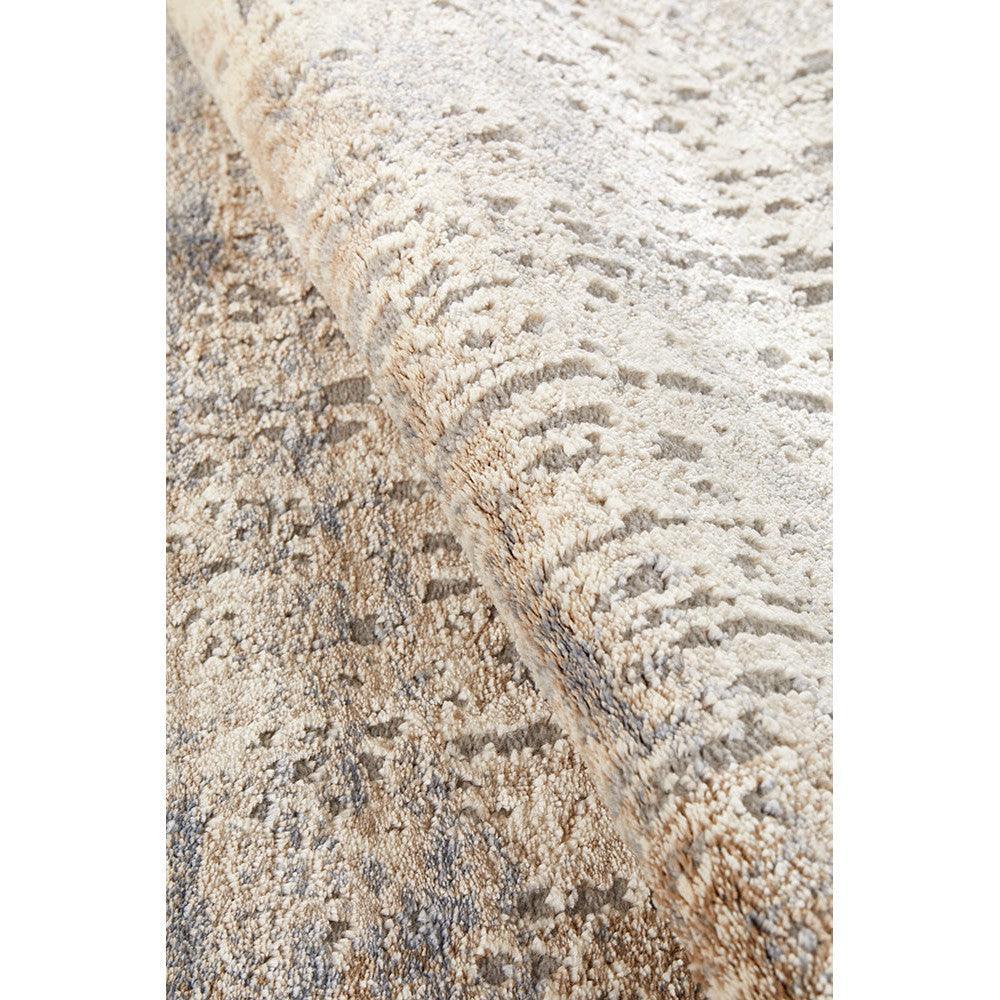 Bronte Nola Powder Runner Rug featuring distressed pattern in ivory, beige and taupe on cream background, hand-tufted wool