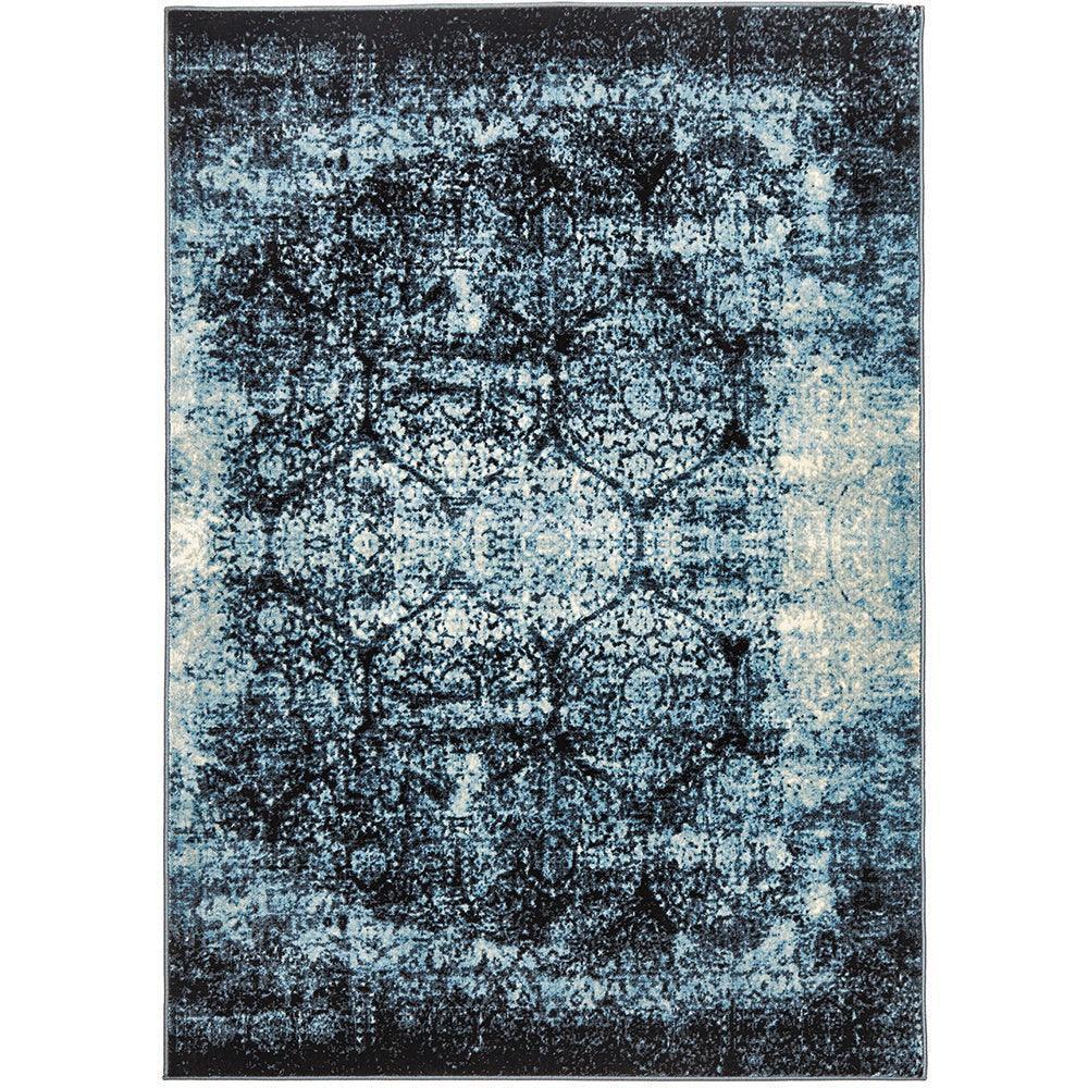 Calypso Navy Rug featuring distressed vintage medallion in navy, sky blue and teal on dark gradient background, machine-made synthetic