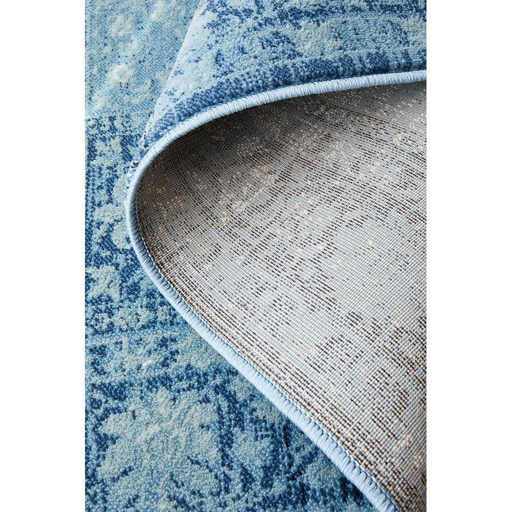 Calypso Blue Rug featuring ornate damask pattern in sky blue, navy and azure on medium blue background, power-loomed polyester
