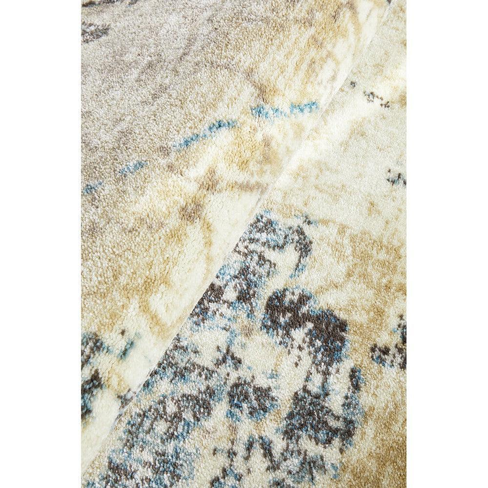 Calypso Bone Rug featuring abstract distressed pattern in cream, beige, blue on ivory background, hand-tufted wool