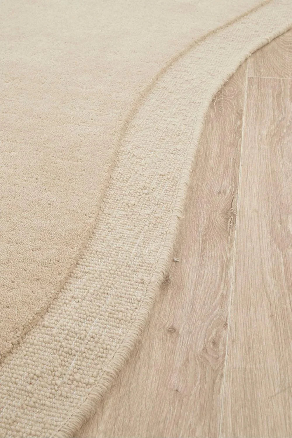 Cleo Beige Rug featuring soft curved border in warm beige on cream background, hand-tufted wool