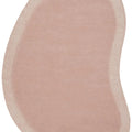 Cleo Blush Rug featuring curved oval design in blush pink and pale pink borders on light blush background, hand-tufted wool