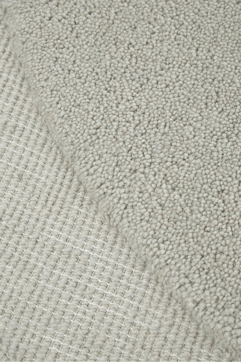 Cleo Dove Rug featuring textured loop-pile in dove grey and cream on a light base, woven texture