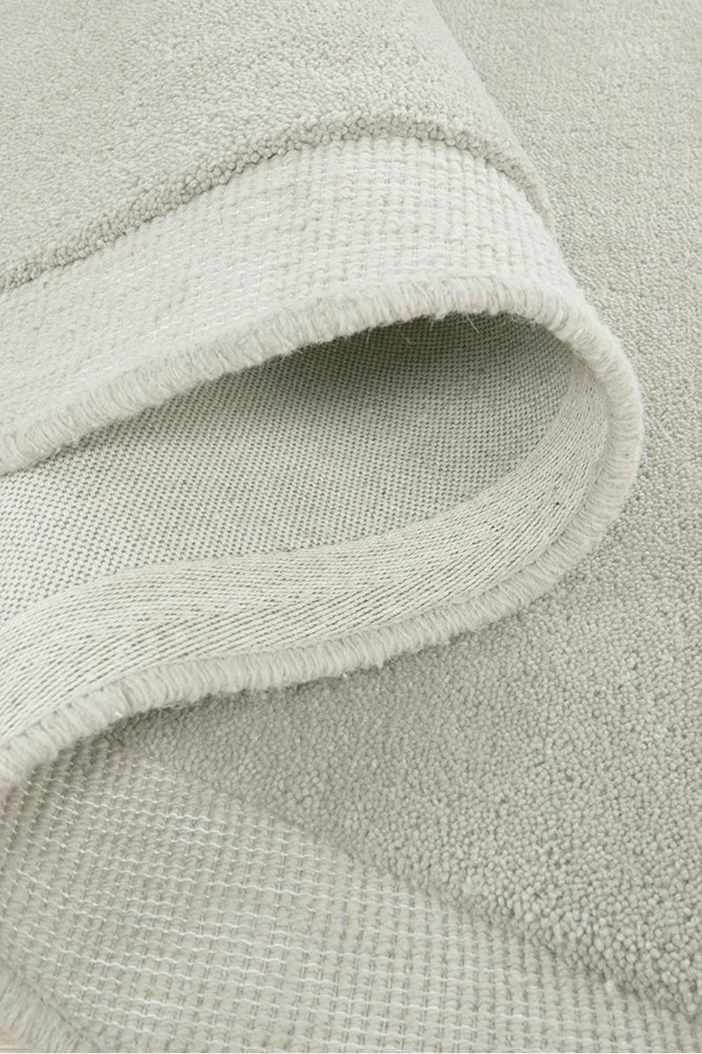 Cleo Dove Rug featuring soft curved texture in cream and dove grey on ivory, hand-tufted wool